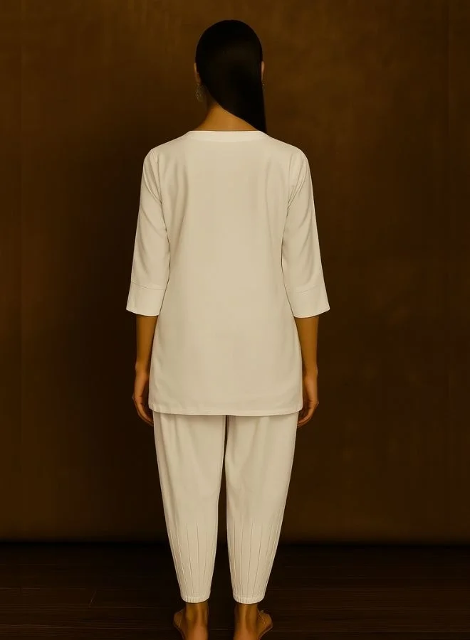 Abhishti Box Pleat solid white Kurta with knife pleat salwar pants