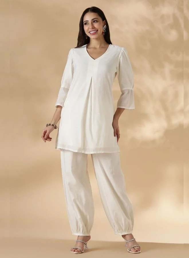 Abhishti Box Pleat solid white Kurta with knife pleat salwar pants