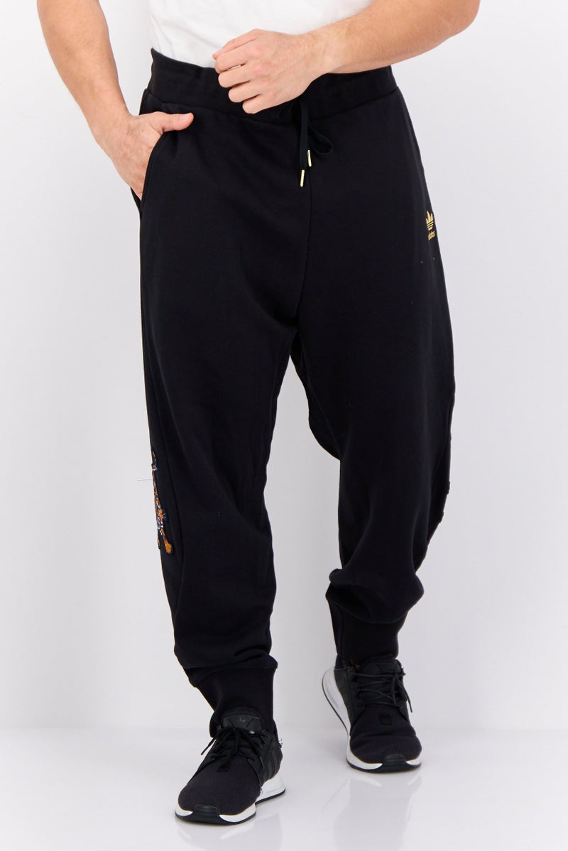 adidas Originals Men Sportswear Fit Outdoor Sweatpants, Black  - Image 1
