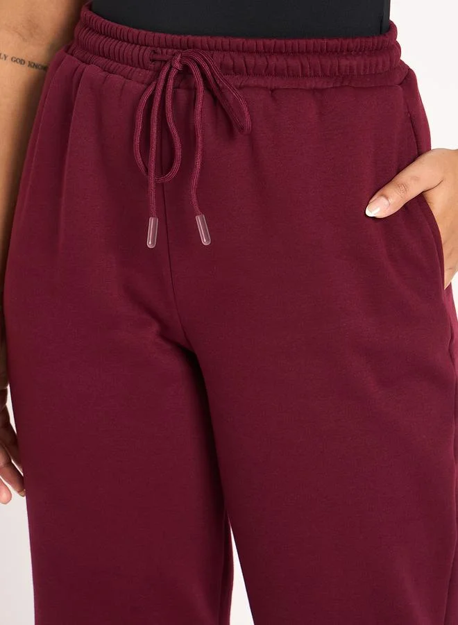 Femmella  Women Burgundy Fleece Joggers for Women | Best Price UAE