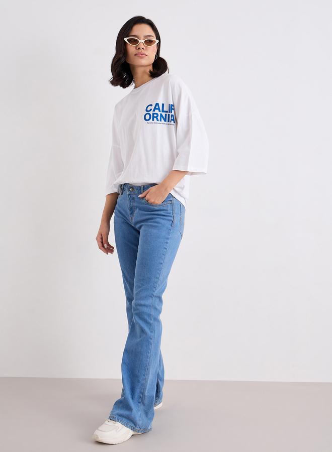 ستايلي تيشيرت فضفاض بطبعة كتابة وياقة دائرية - Image 1