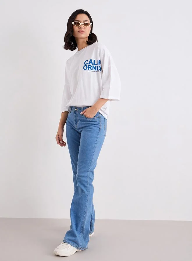 Styli Slogan Print Round Neck Oversized T-Shirt