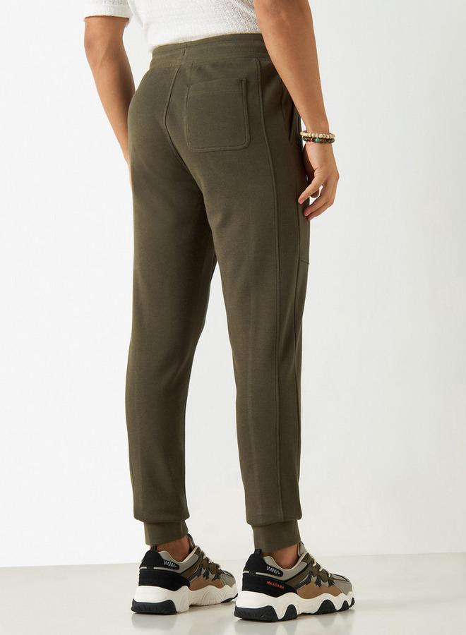 ايكونيك بنطلون رياضي سادة بقصة ضيقة ورباط إغلاق وجيوب من آيكونيك - Image 3