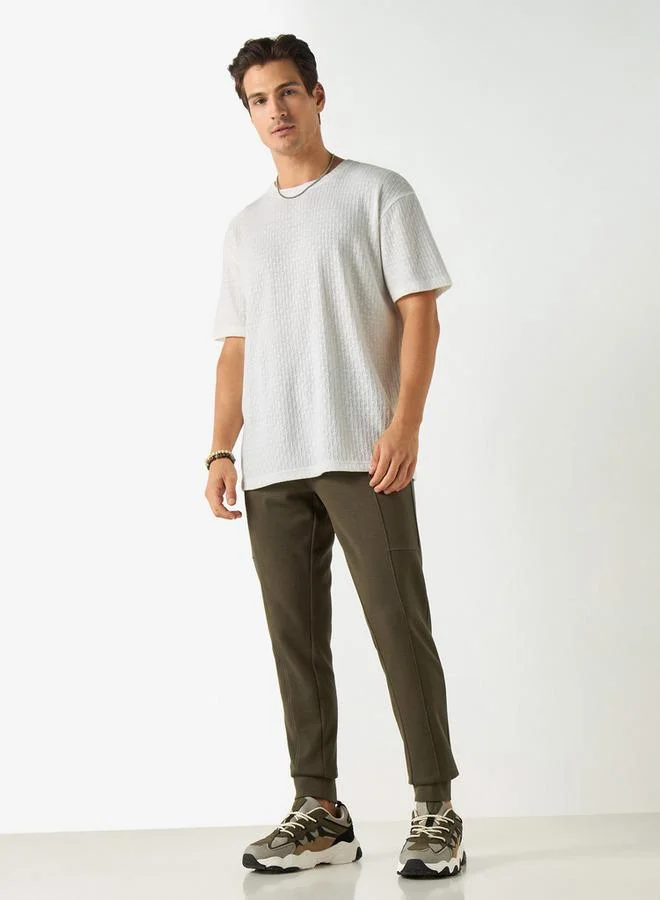 ايكونيك بنطلون رياضي سادة بقصة ضيقة ورباط إغلاق وجيوب من آيكونيك