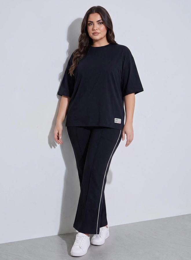 Styli Plus Size Black Solid Round Neck Oversized T-Shirt with Patchwork Detail - Image 2