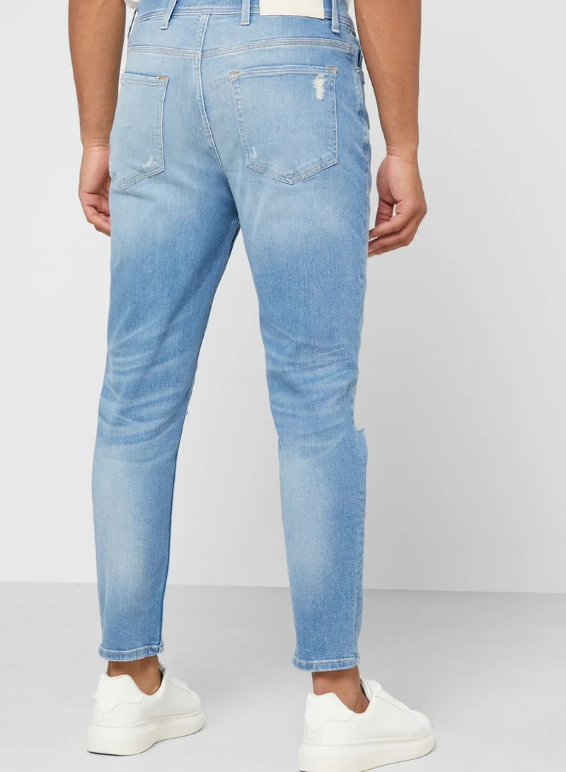 RIVER ISLAND Light Wash Tapered Jeans