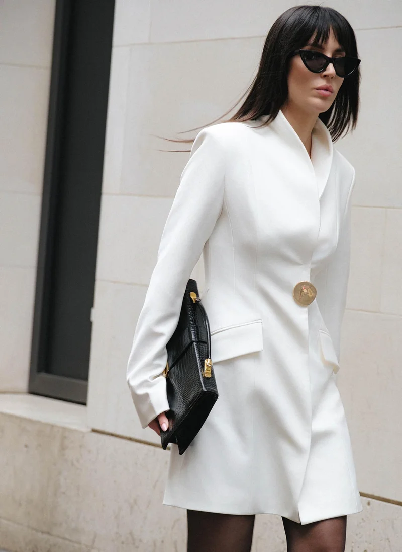 Mini blazer dress with an accent brooch