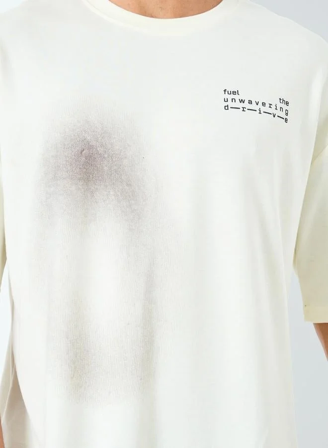 ستايلي اكتيف تيشيرت بقصة واسعة وطبعة كتابة