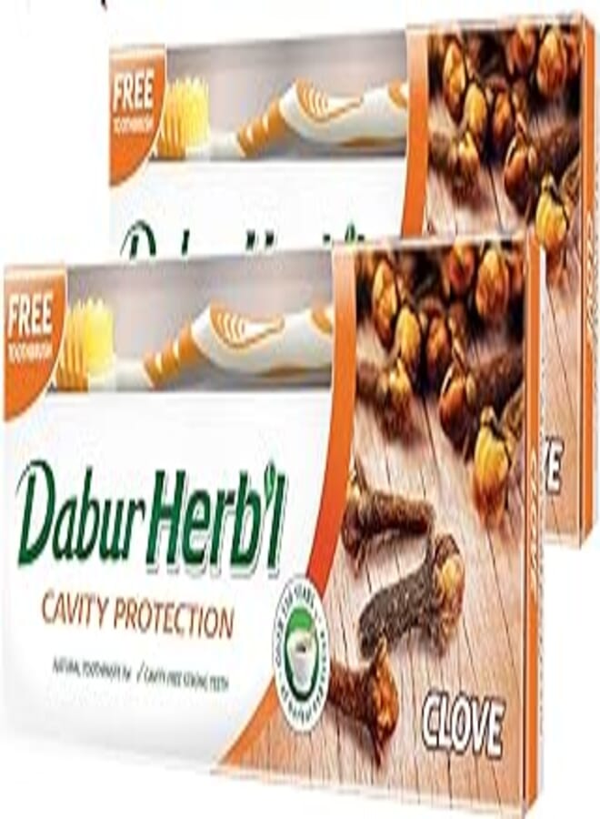 Dabur Herbal Cavity Protect Clove Toothpaste, 140 gm + Toothbrush (Pack Of 2)