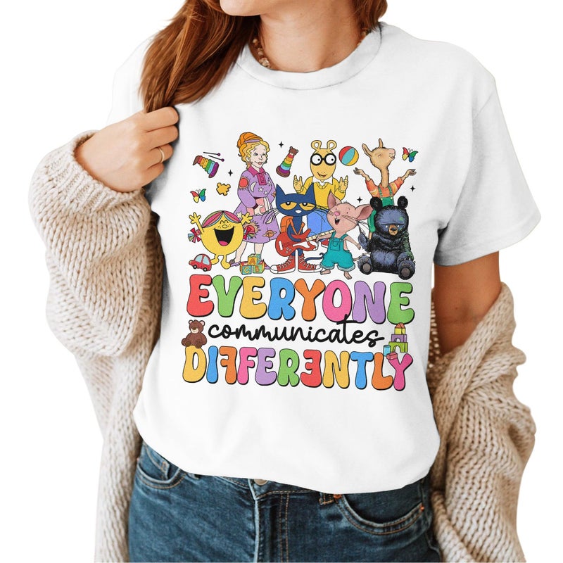 InterStellux Everyone Communicates Differently Shirt - Autism Support T-Shirt - Autism Awareness Month T-Shirt - Special Education Teacher Tshirt - ADHD Teacher Shirt - Gifts for Teachers (White,L) - Image 1