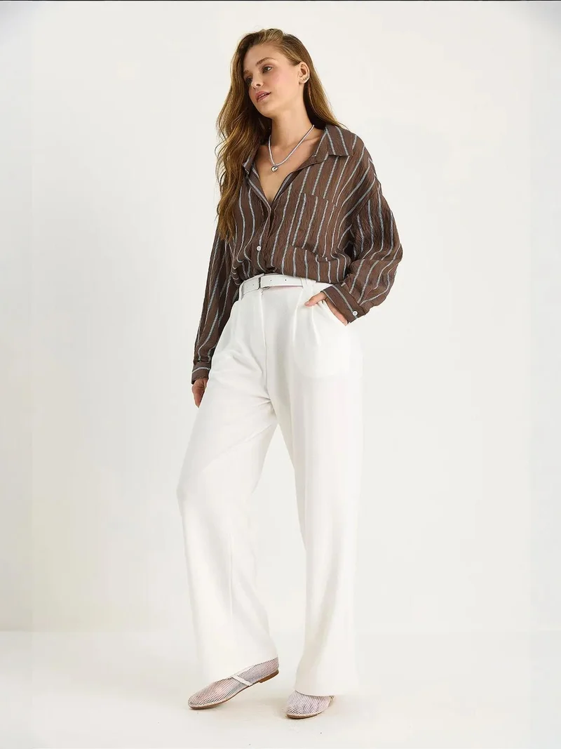 بيانكو لوتشي بنطلون واسع الساق محبوك بحزام لوتشي