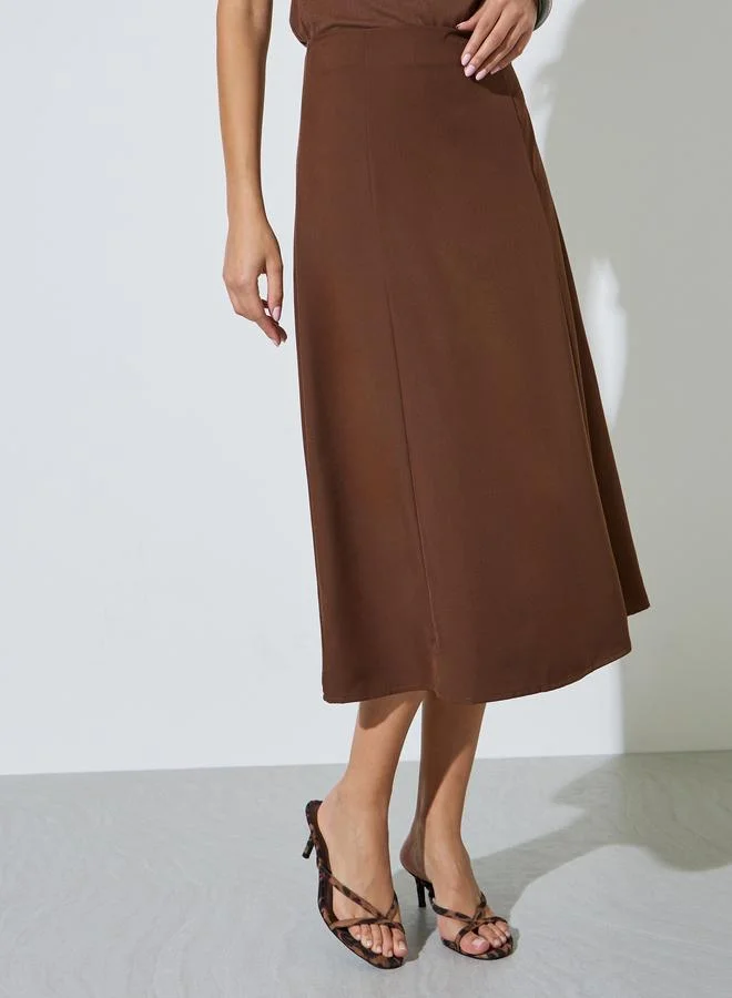 ستايلي Brown High Rise Solid A-Line Midi Skirt