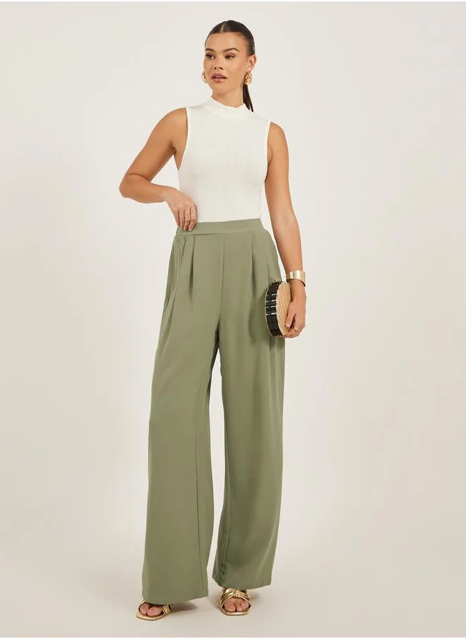 لوكس ويف Solid Pleated Straight Leg Pants by Styli