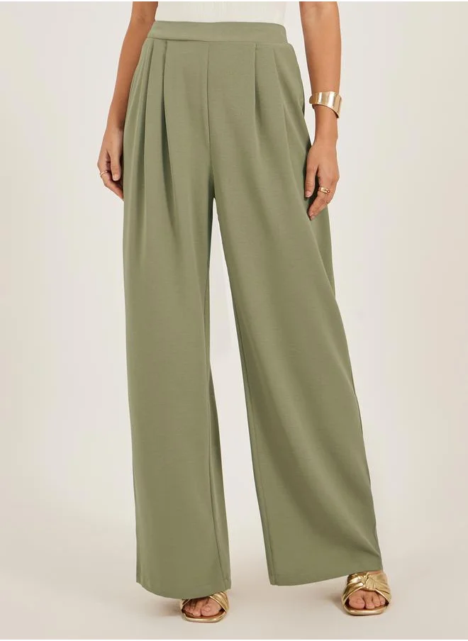لوكس ويف Solid Pleated Straight Leg Pants by Styli