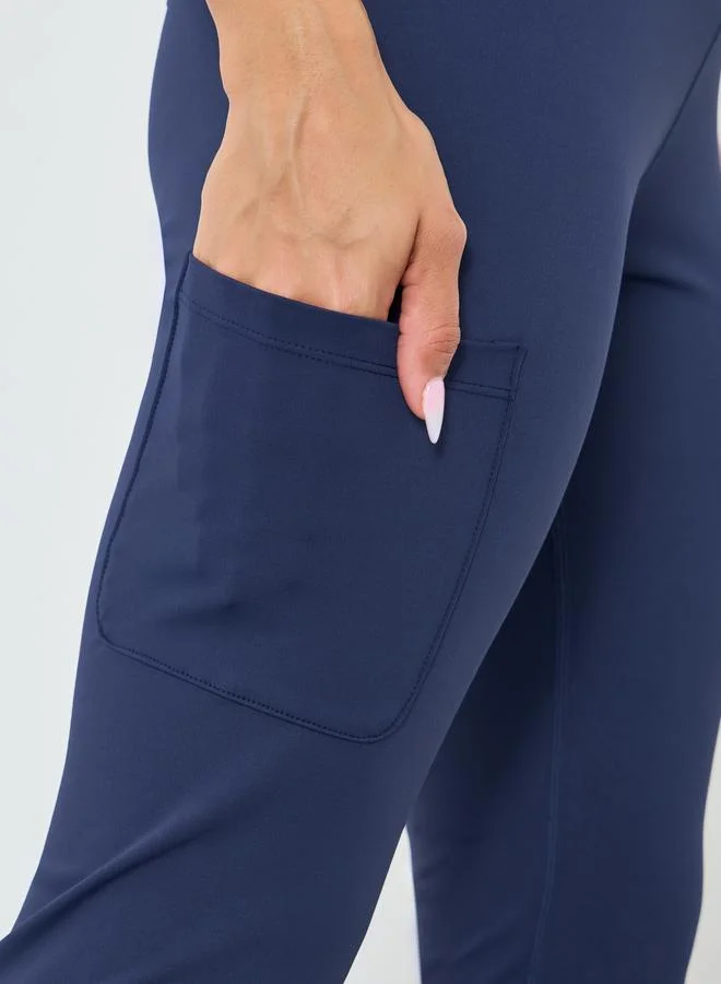 Styli Active Navy Blue Women Knee Rubber Logo Side Pocket Leggings for Women | Best Price UAE