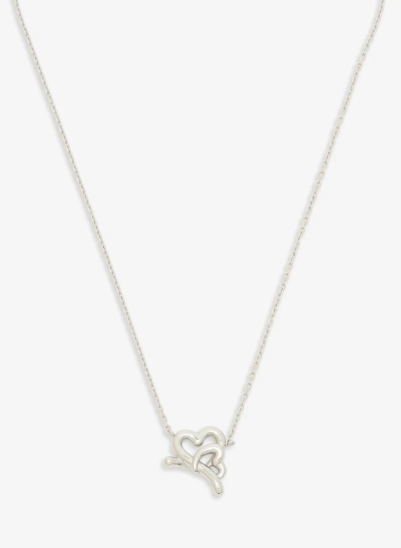 جس قلادة قلبين متشابكين