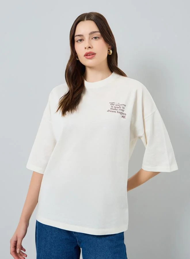 Styli Women Off White Slogan Oversized T-Shirt