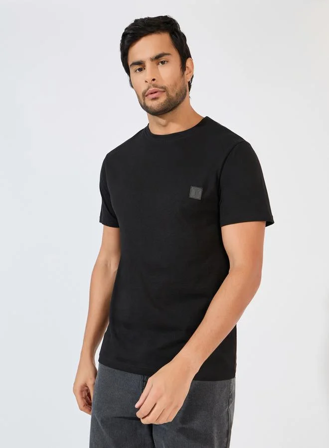 Styli Crew Neck Regular Fit T-Shirt with Silicon Badge