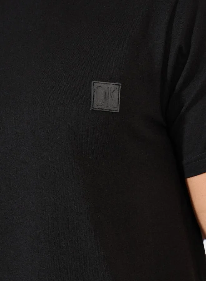 Styli Crew Neck Regular Fit T-Shirt with Silicon Badge