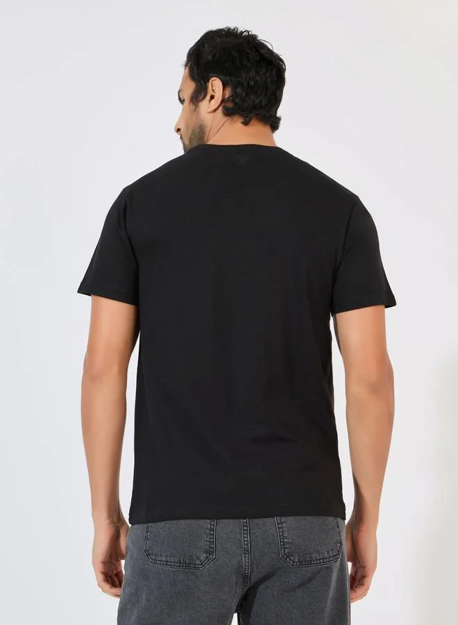 Styli Crew Neck Regular Fit T-Shirt with Silicon Badge