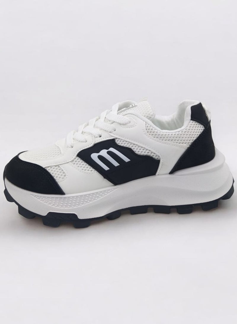 Elegant women's shoes in black and white  - Image 1