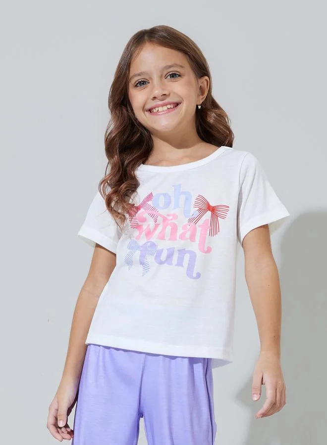 Styli Girls White Graphic Print T-Shirt and Purple Pants Pyjama Set