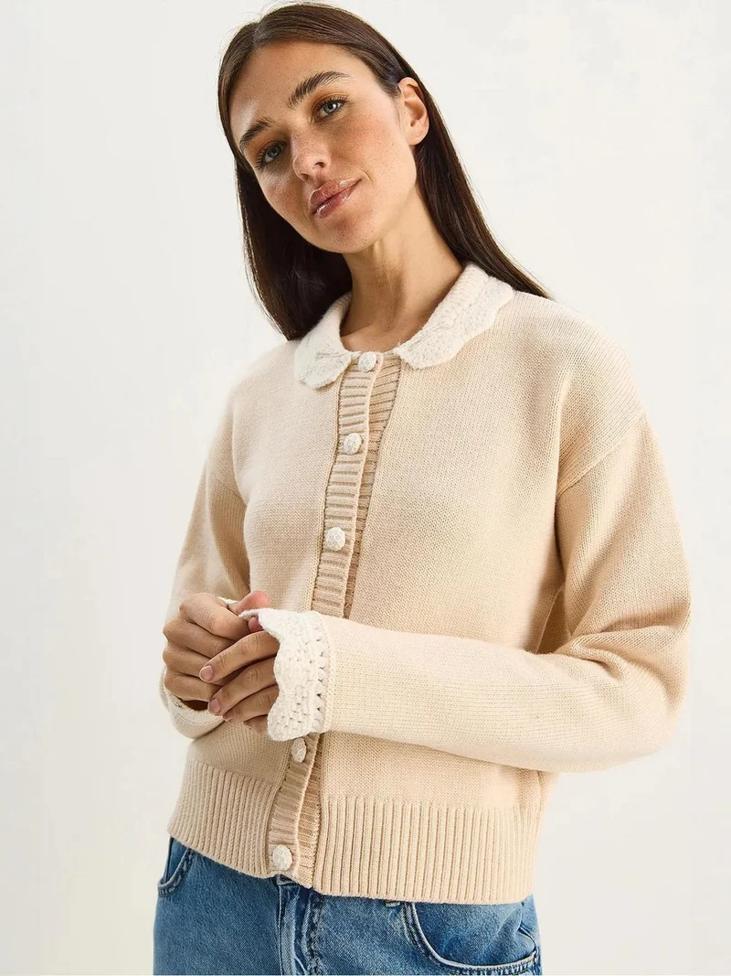 بيانكو لوتشي كارديجان محبوك مضلع سميك بأزرار من لوتشي