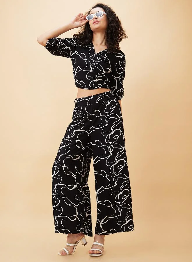 جلو باص Globus Abstract Print Tie Back Crop Top and Flared Palazzos Co-Ords