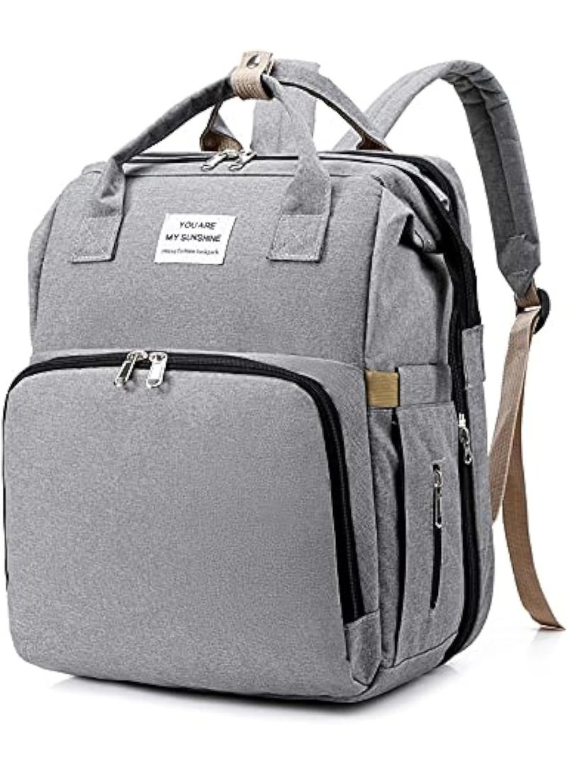 YOU ARE MY SUNSHINE 4-in-1 Diaper Bag Backpack — Unisex Baby Diaper Backpack, Multifunctional Changing Station + Toy Bar + Organizer, Large Capacity Mom & Dad Travel Nappy Bag, Waterproof Polyester Exterior & Durable Lining, Built-in USB Charging Port, Hands-Free Stroller Strap, Easy Access Side Pockets for Bottles & Wipes, Anti-Theft Back Pocket, Ergonomic Padded Shoulder Straps, Gray — Ideal for Newborns, Travel, Daily Use, Hospital Bag, Gift for Parents — Compact Dimensions 32 x 20 x 23 cm, Lightweight 1 kg, Modern Sleek Design for KSA Families — Organized Compartments for Diapers, Clothes, Feeding Accessories & Electronics — Converts Quickly to Changing Mat & Play/Toy Bar — Machine-Friendly Care & Long-Lasting Finish — Noon KSA Ready Listing, Fast Access, Practical Parenting Solution - Image 1