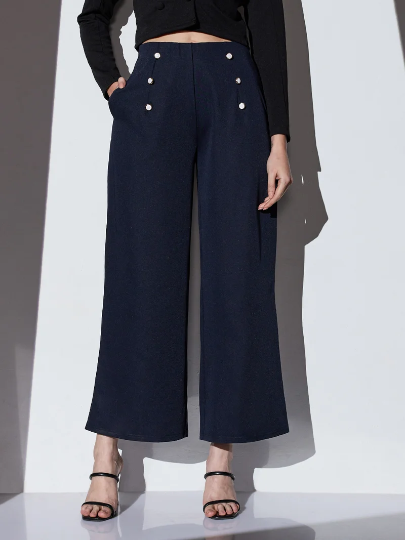 جلو باص بنطلون نسائي واسع الساق بخصر متوسط و تفاصيل أزرار بلون كحلي سادة