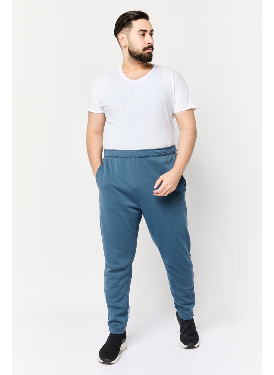 Reebok Men Sportswear Fit Brand Logo Outdoor Sweatpants, Teal Blue  - Image 2
