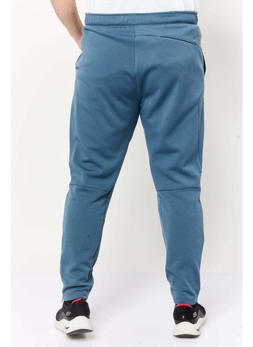 Reebok Men Sportswear Fit Brand Logo Outdoor Sweatpants, Teal Blue  - Image 4