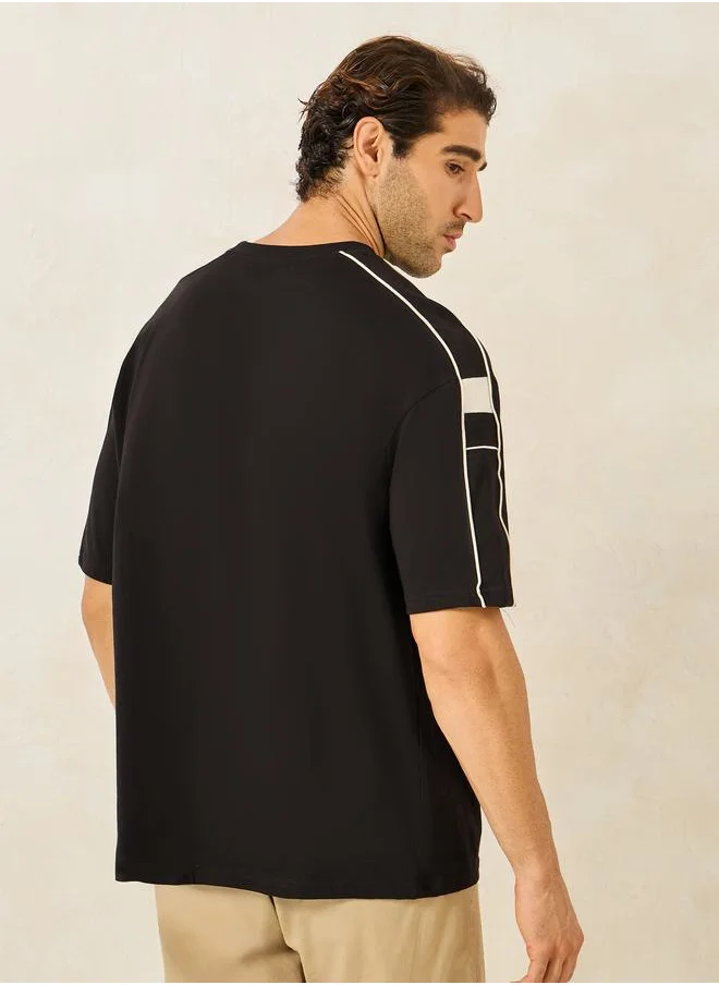 Styli Compact Jersey Piping Shoulder Detail Oversized T-Shirt with Chest Print