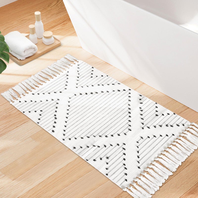 MitoVilla MitoVilla Black White Boho Rug 2'x3'  Off White Small Bathroom Rug with Tassel  Farmhouse Kitchen Bath Mat  Bohemian Runner Rug for Bedroom  Washable Cotton Woven Hallway Laundry Entryway Throw Rug  - Image 1