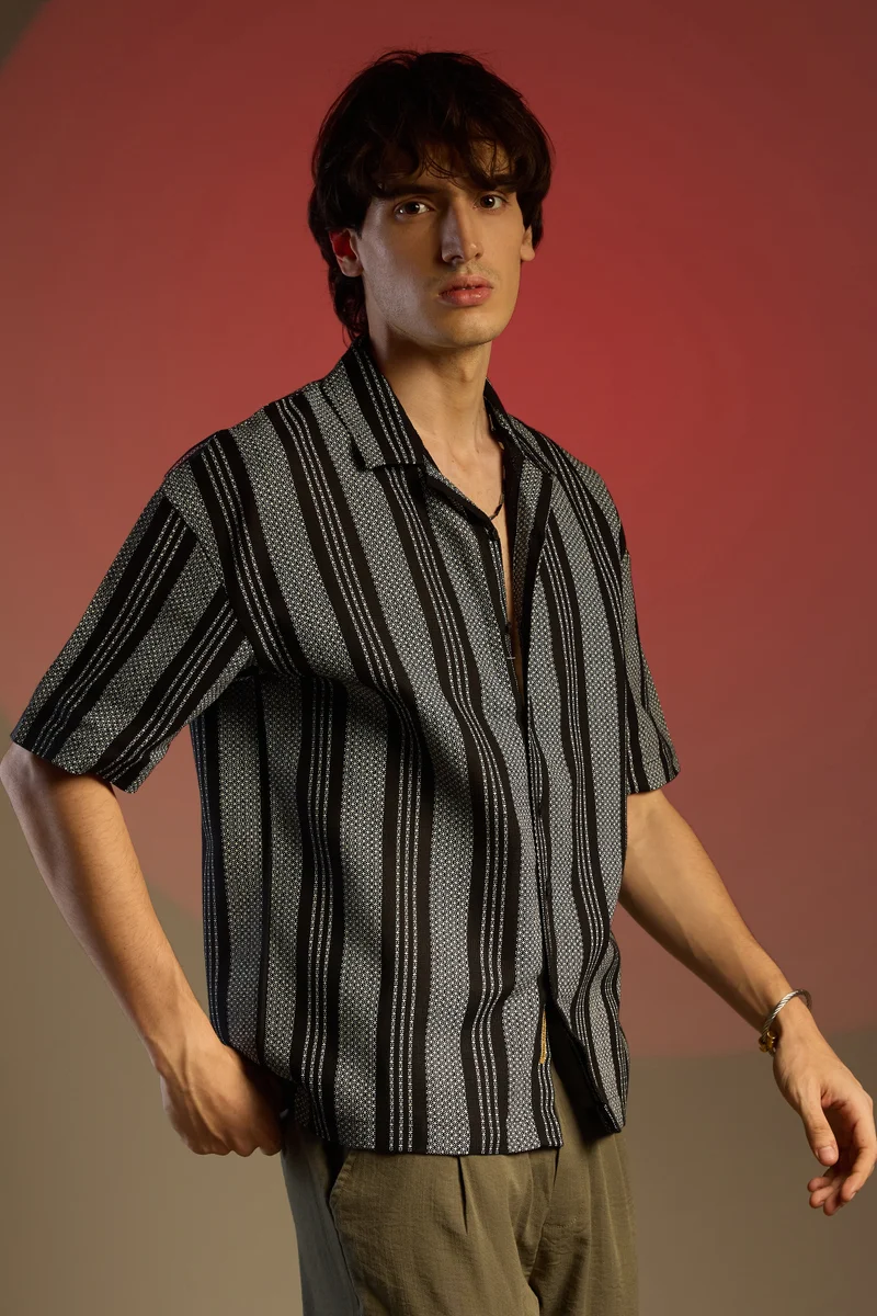 Campus Sutra Campus Sutra Men's Obsidian Black Woven Striped Oversized Shirt For Casual Wear | Cuban Collar | Short Sleeve | Button Closure | Oversized Shirt Crafted With Comfort Fit For Everyday Wear