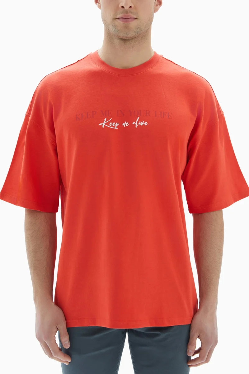 Wecre8 Orange "Keep Me Alive" Printed T-shirt By WECRE8