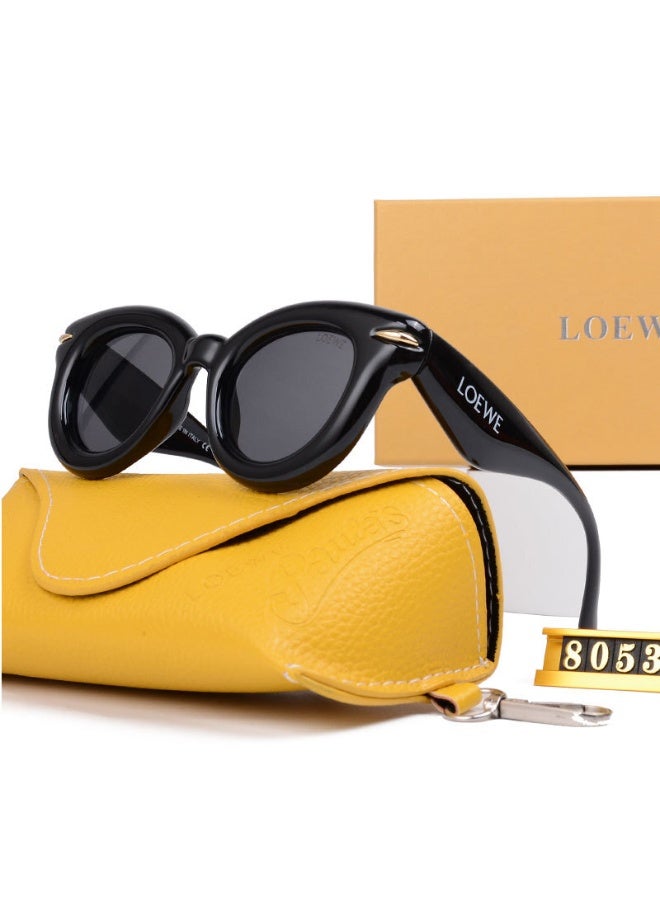 LOEWE نظارات شمسية دائرية سوداء من لويفي مع علبة تحمل العلامة التجارية