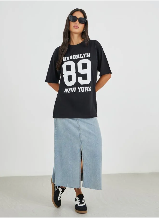 ستايلي Styli Brooklyn 89 Slogan Print Short Sleeve Oversized T-Shirt