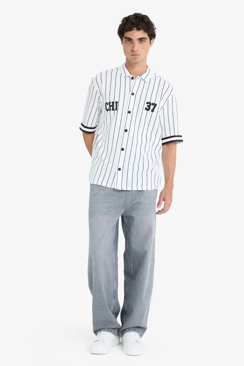 ديفاكتو Relax Fit Polo Neck Printed Short Sleeve Shirt