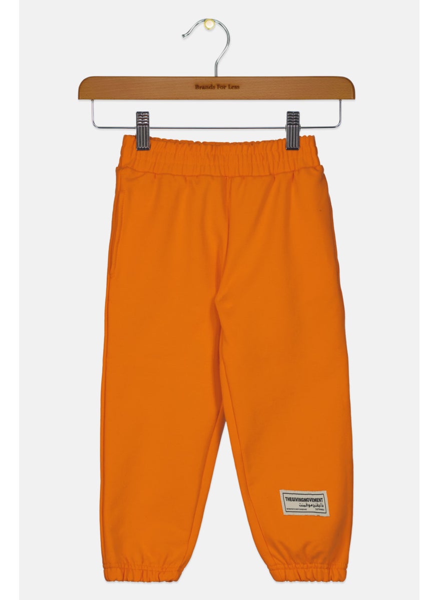 The Giving Movement - Kids Boy Embroidered Jogger Pants, Orange - Image 1