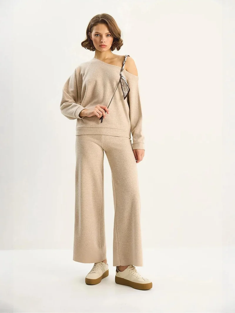 بيانكو لوتشي طقم قطعتين مفصل من لوكسي للملابس المحبوكة