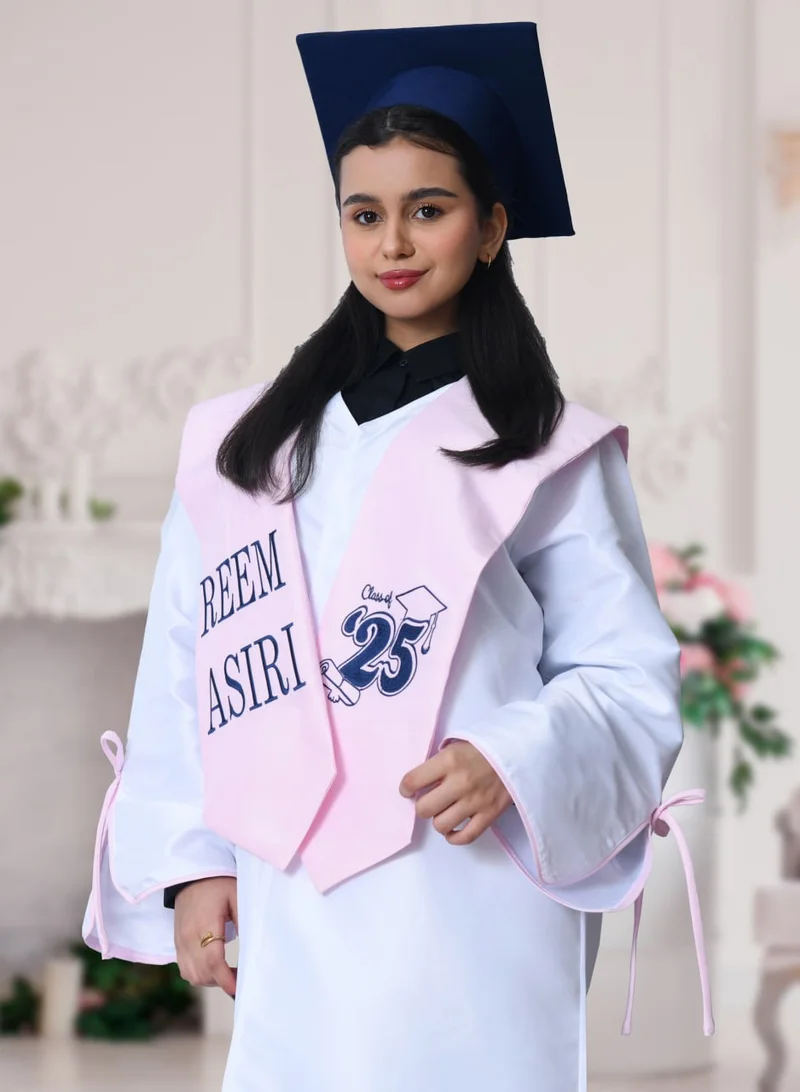 HAWRAA ABAYA Graduation uniform: a bright white abaya with a wide, open sleeve decorated with a bow, with a scarf and a plain cap in pink