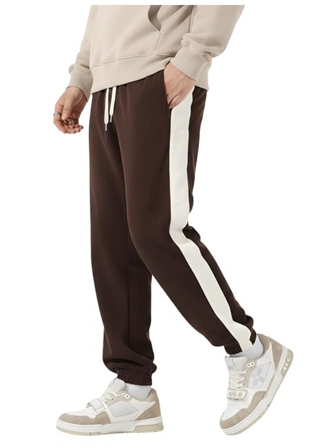 greciilooks سروال رياضي (Joggers) رجالي من GRECIILOOKS، مصنوع من مزيج القطن والبوليستر مع شريط جانبي، بنمط كاجوال وقصة مريحة، مناسب للارتداء الخارجي (مقاس 2XL) - Image 1