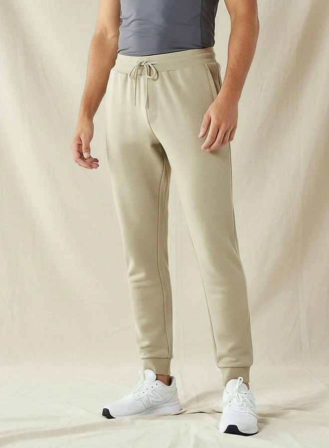 Men Regular Fit Joggers with Pockets