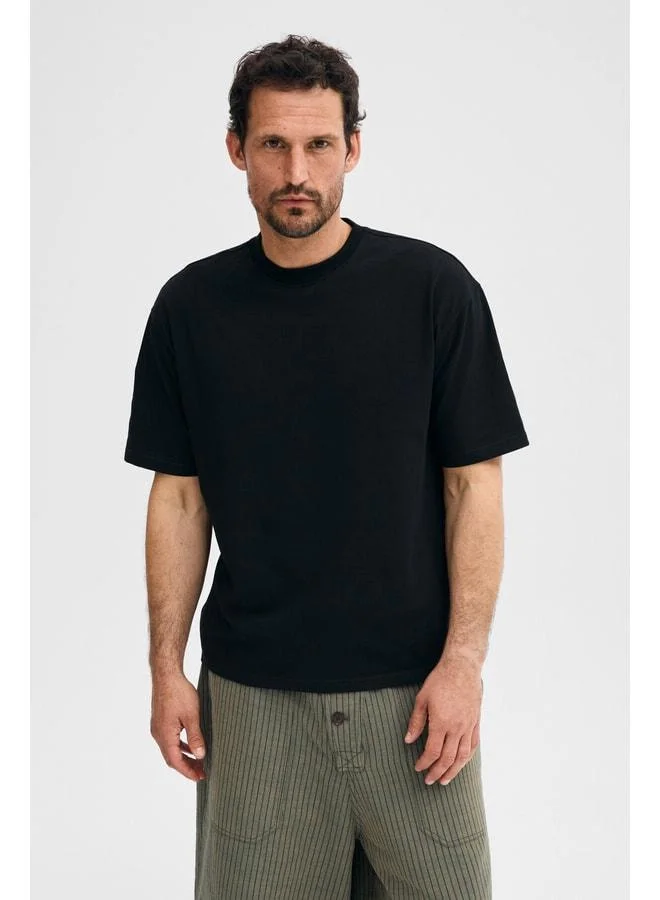 Grimelange DUNNO Men's 100% Organic Cotton Round Neck Regular Fit Black T-Shirt.