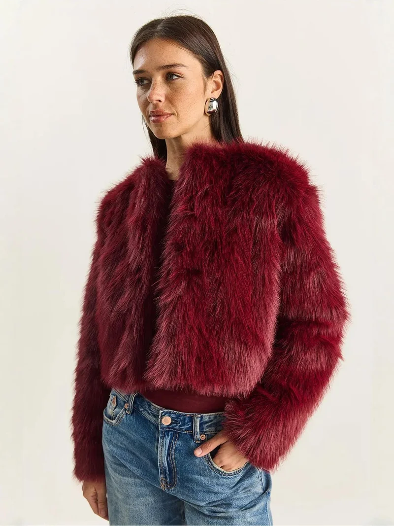 بيانكو لوتشي معطف فرو صناعي قصير من لوكسي