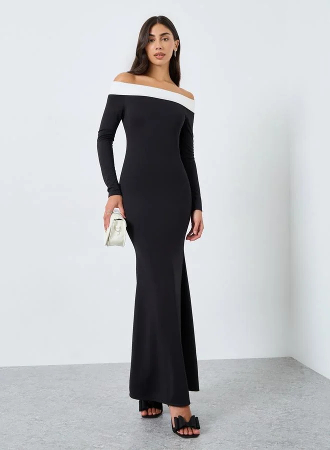 ستايلي فستان طويل بحافة ميرميد وأكتاف مكشوفة