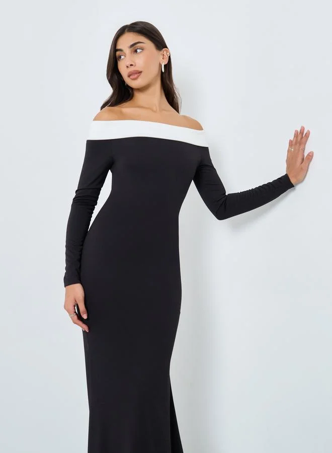 ستايلي فستان طويل بحافة ميرميد وأكتاف مكشوفة