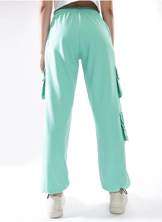 هوبرهولمي Women Track Pants in Multicolor featuring Jogger fit with a colourblocked pattern, no sleeves, regular length, secured with elasicated + drawstring closure, crafted from terry – a must-have for those who love trendy fashion.