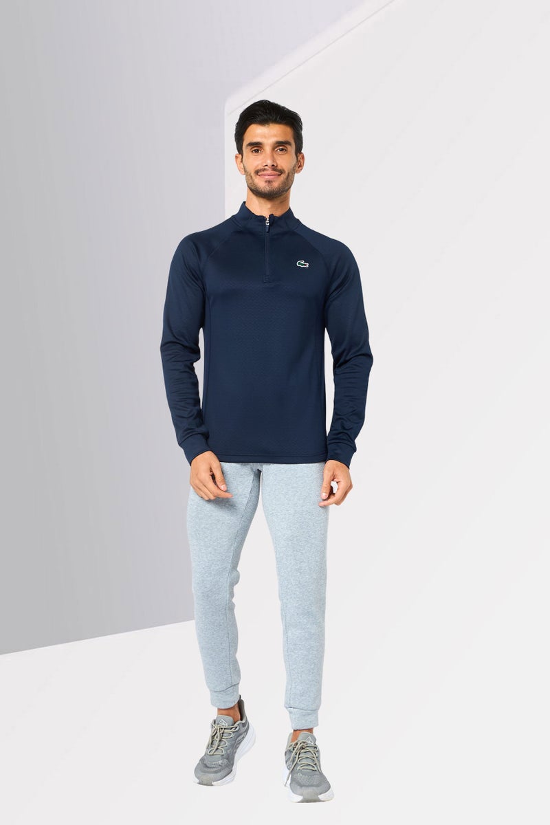 LACOSTE سويت شيرت رجالي بأكمام طويلة وياقة مرتفعة، شعار العلامة التجارية، أزرق داكن - Image 2